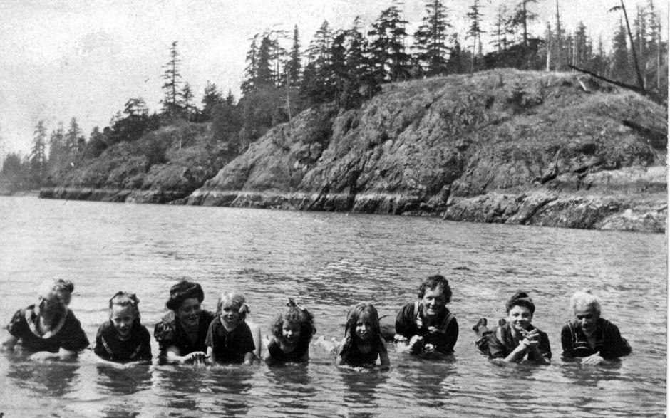 Women and children in the water off Cowan's Point ca 1908